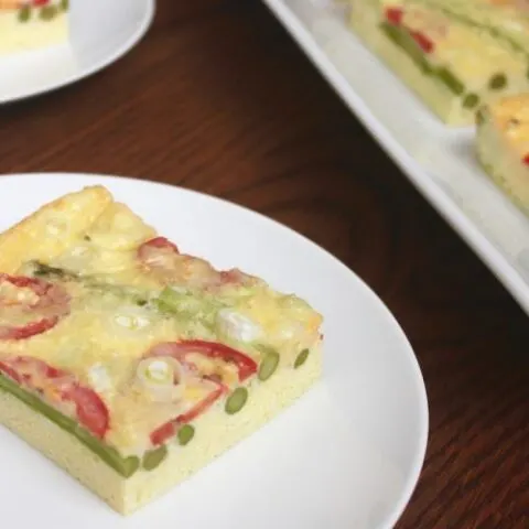 asparagus and tomato frittata with sharp cheddar cheese