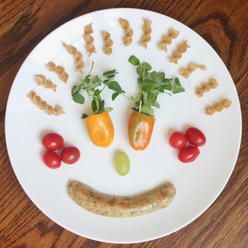 dinner served as a silly face to encourage picky eaters to eat healthy