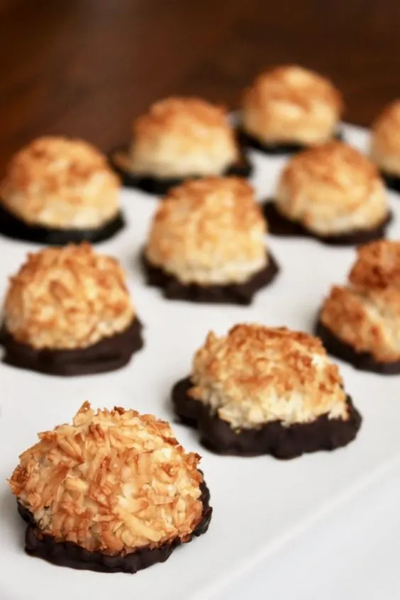 Paleo coconut macaroons dipped in chocolate