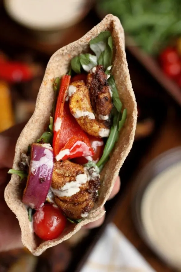 Serve healthy chicken shawarma in a pita with your favorite vegetables for an easy weeknight dinner