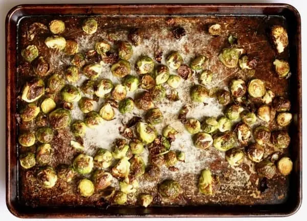 Perfectly roasted brussels sprouts ready to coat in pistachio sage relish